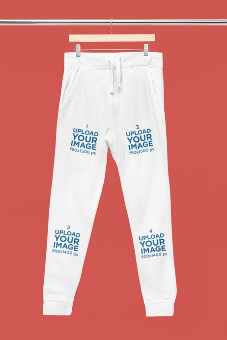 Placeit - Mockup of a Pair of Sweatpants Hanging From a Steel