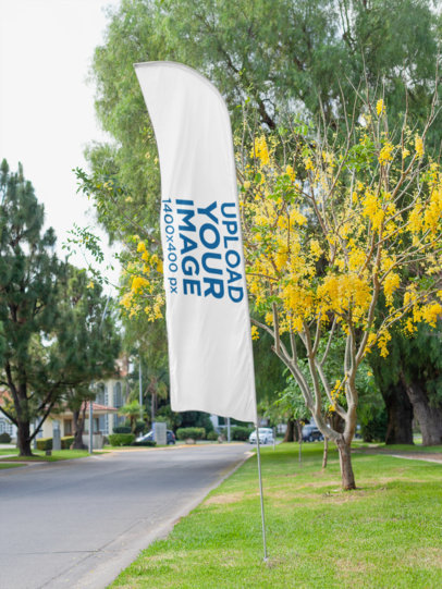 Mockup of a Flag Banner at a Park 28013