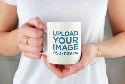 Drinkware Mockup of a Woman Holding an 11 oz Coffee Mug 2954-el1