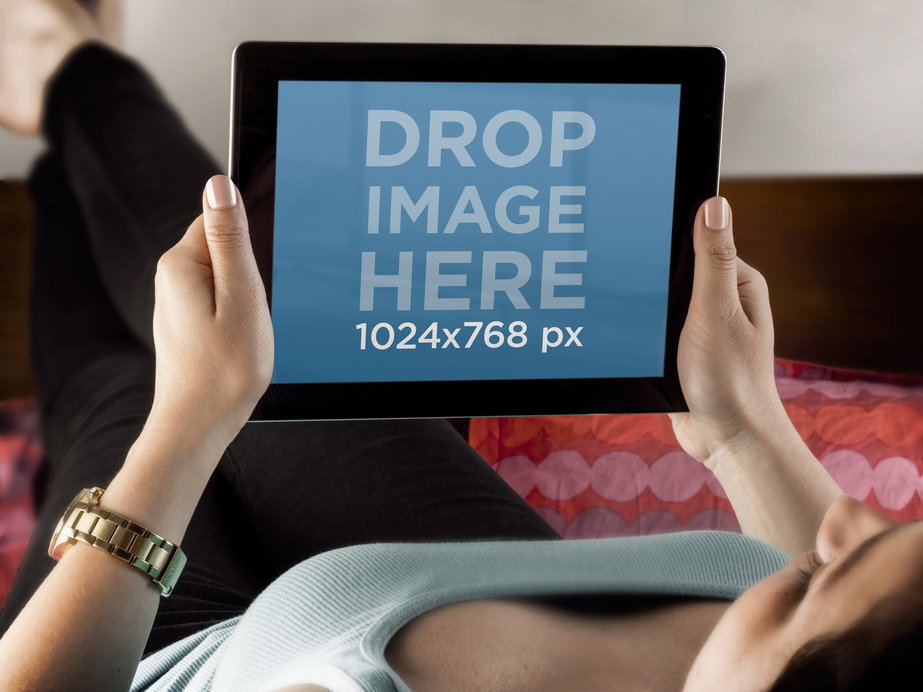 Placeit iPad Mockup Featuring a Woman Lying on Her Bed