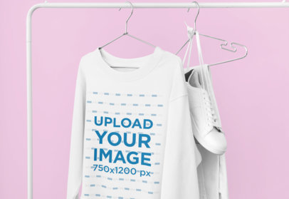 Mockup of a Sweatshirt Hanging From a Rack at Home 33976a